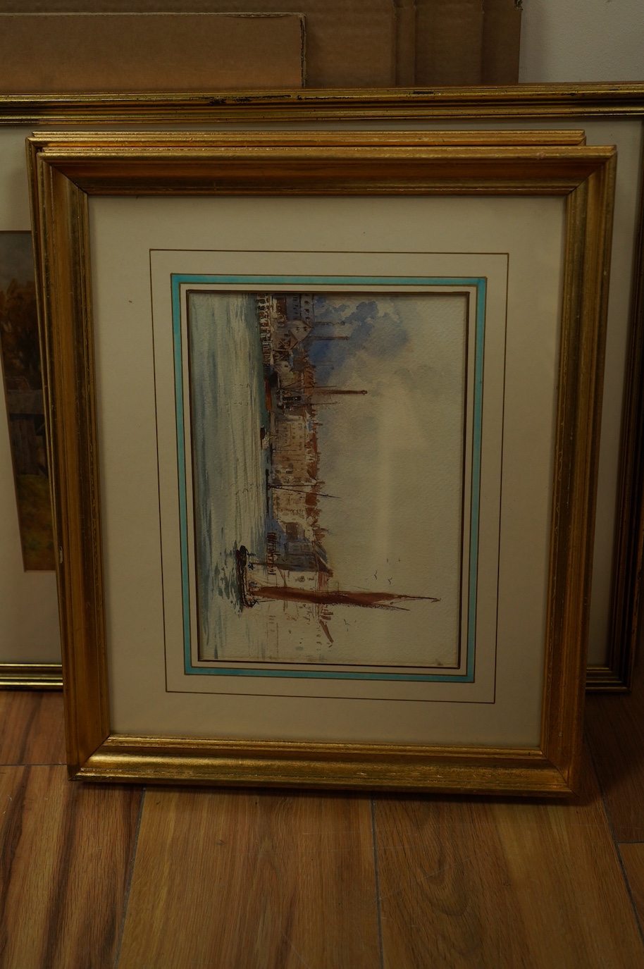 Four early 20th century and later watercolours, to include one by Sam Garratt, Riverscape and a French School watercolour, View of an archway, largest 38 x 25cm. Condition - fair